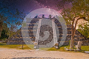 Ruins of El Osario pyramid, Chichen Itza, Yucatan, Mexico, Maya civilization with Milky Way Galaxy stars night sky