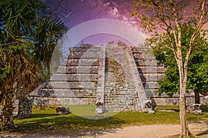 Ruins of El Osario pyramid, Chichen Itza, Yucatan, Mexico, Maya civilization with Milky Way Galaxy stars night sky