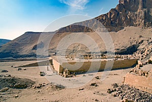 Ruins and esplanade seen from the temple in honor of the pharaoh