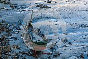 Ruins fishing boat in harbor of Safi