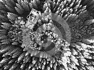 Ruins of former tin mine in the forest from above