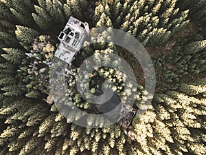 Ruins of former tin mine in the forest from above