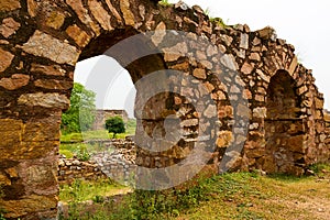 Ruins fragment of Tughlaqabad Fort in Delhi India