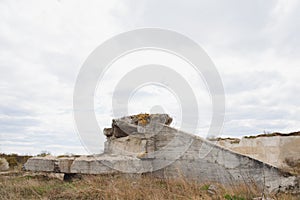 The ruins of german bunker in the beach of Normandy, France