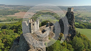 Ruins of Gothic castle Trosky in National Park Czech Paradise. Aerial view to medieval monument in Czech Republic.