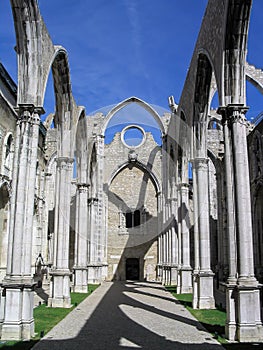 Ruins of the Gothic Church of the Carmo Convent aka Our Lady of Mount Carmel. Roofless nave and arches stand as a testimony to the photo