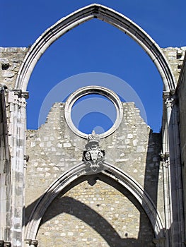 Ruins of the Gothic Church of the Carmo Convent aka Our Lady of Mount Carmel. Roofless nave and arches stand as a testimony to the photo