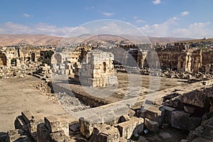 Ruins of great court of Heliopolis with mountains in the background in Baalbek, Bekaa valley Lebanon