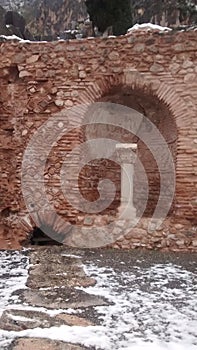 Ruins greeks ofa  column in winter
