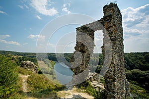 Ruins of Gubkiv Hubkiv castle on a Sluch river hills in summer near Gubkiv village, Rivne region, Ukraine photo