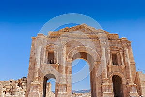 The ruins of Hadrainâ€™s Arch in Jerach, Jordan, summer time.