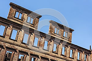 Ruins of Heidelberg castle - Closeup of detached wall with empty windows of the famous renaissance castle and landmark of Heidelb