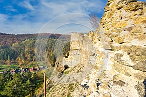 Ruins of hrad Sasov castle near river Hron during autumn