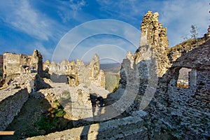 Ruins of hrad Sasov castle near river Hron during autumn