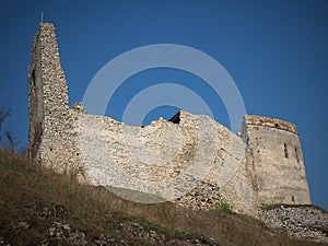 The ruins of a large old castle with an interesting background