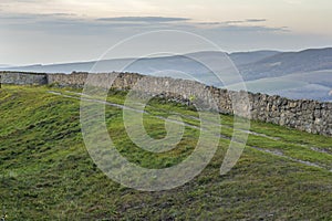 Ruins of long wall of medieval stronghod