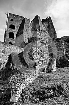 Ruins of medieval castle in Europe. Black and white photography of Medieval ruins castle. View of Likava castle in Likavka village