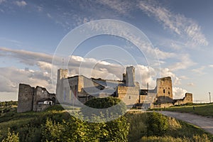 Ruins of the medieval castle of the Livonian knight`s order at sunset. , Rakvere