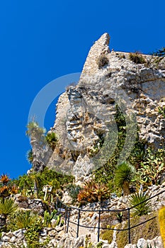 Ruins of medieval fortress castle in Exotic Botanic Garden Le Jardin de Exotique on top of historic town of Eze in France