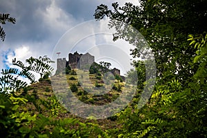 Ruins of medieval fortress Maglic on top of hill by the Ibar river in Serbia photo