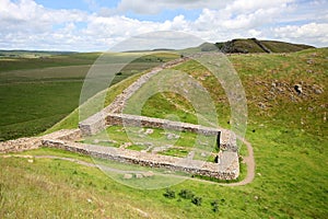 Ruins of military guardhouse on Hadrian`s Wall photo