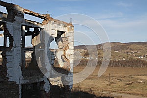 The ruins of the mountain-concentrating industrial complex (GOK) in the village Tuim