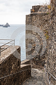 Ruins of the Norman castle in Aci Castello, Sicily island