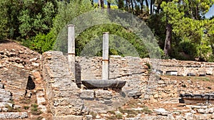 Ruins of the Nymphaion or Nymphaeum a monumental fountain in ancient Olympia, Greece photo