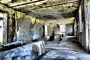 Ruins of an old and abandoned building in a field captured during the daytime