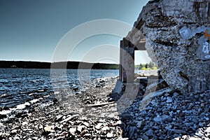 Ruins of an old and abandoned building in a field captured during the daytime