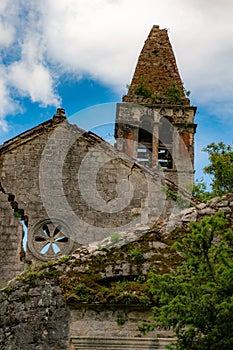 The ruins of an old abandoned Catholic church Stara Zupna Crkva on Mount Vrmac, the town of Prcanj, the Bay of Kotor, Montenegro