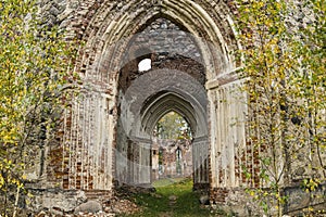 The ruins of an old abandoned church. A large ruined old building of church