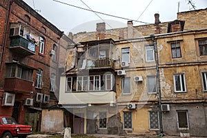 Ruins of an old abandoned city. Ruined house in which poor peopl