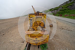 Ruins of an old abandoned mining ore track and mining car at Independence Mine Alaska