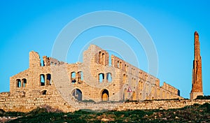 Ruins of an old brick factory. Destroyed industial plant photo