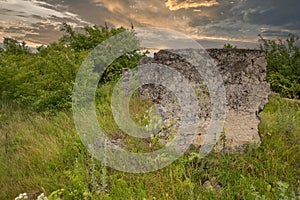 ruins of an old building at sunset