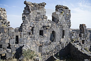 Ruins of an old castle. Entrance door and window of an old castle. Fortress towers and walls