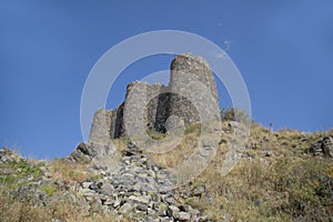 Ruins of an old castle. Entrance door and window of an old castle. Fortress towers and walls
