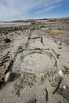 Ruins of old pier at Silver Sands beach in Milford, Connecticut.