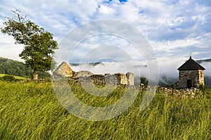 Ruins of the old stone Hussite fortification with watchtower in