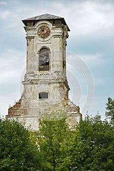 Ruins of old tower with clock in Preso photo