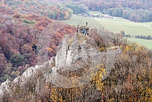 Ruins of Ostry kamen castle in autumn Male Karpaty mountains