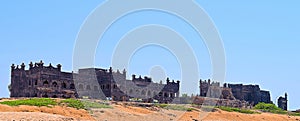 Remains of Palace - Panoramic View of Historic Old Ruined Castle with Sand, Green Grass, and Blue Sky - Chorwad, Gujarat, India