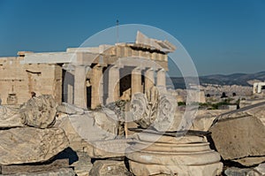 Ruins of Parthenon temple with monumental gateway Propylaea in t