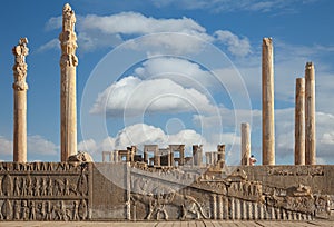 Ruins of Persepolis UNESCO World Heritage Site Against Cloudy Blue Sky in Shiraz City of Iran