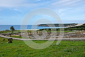 Ruins Roman in bolonia beach photo