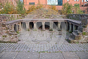 Ruins of a roman bath in the Roman Gardens in Chester,UK.