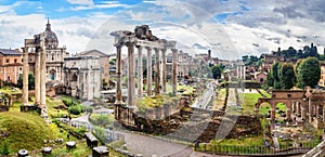 Ruins of Roman Forum. Temple of Saturn, Temple of Vespasian and Titus, Arch of Septimius Severus and others. Rome. Italy photo