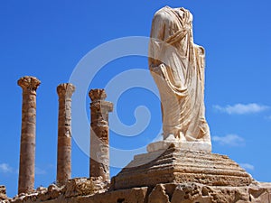 Ruins of Sabratha, Libya - Colonnade and Statue photo