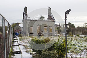 The ruins of a small detached bungalow that was destroyed recently by a devastating fire and is awaiting demolition